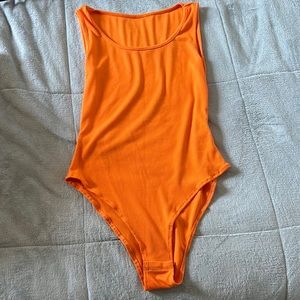 Bright orange cotton body suit size small